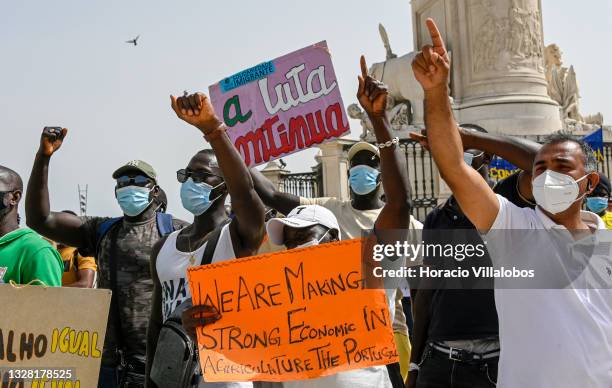 Demonstrators gather in Praça do Comercio to protest against current practices by SEF related to immigrants trying to get their First Residence...