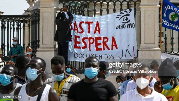 Demonstrators gather in Praça do Comercio to protest against current practices by SEF related to immigrants trying to get their First Residence...