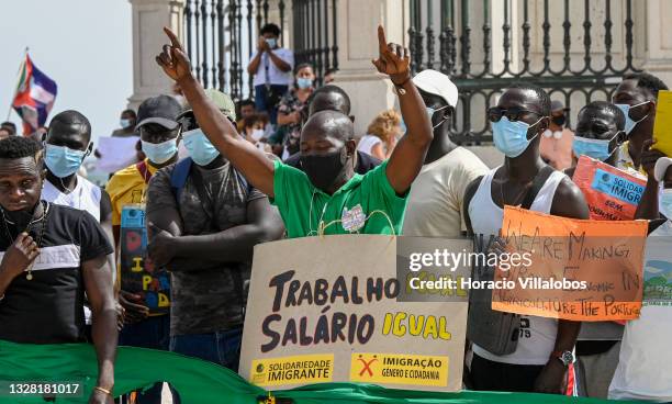 Demonstrators gather in Praça do Comercio to protest against current practices by SEF related to immigrants trying to get their First Residence...