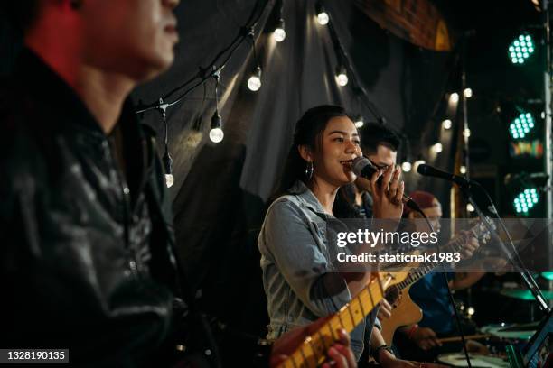 in concert. - asian singer stock pictures, royalty-free photos & images