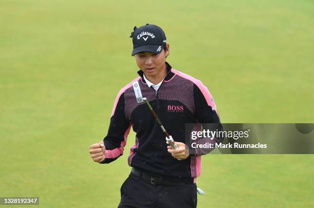 Min Woo Lee of Australia celebrates victory on the18th green after his birdie in the play-off hole during Day Four of the abrdn Scottish Open at The...