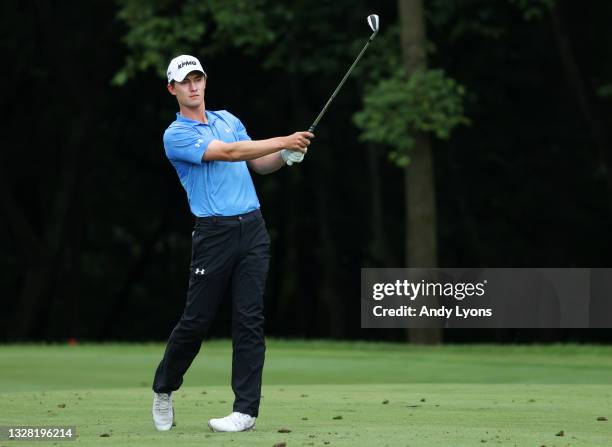 Maverick McNealy plays his second shot on the sixth hole during the final round of the John Deere Classic at TPC Deere Run on July 11, 2021 in...