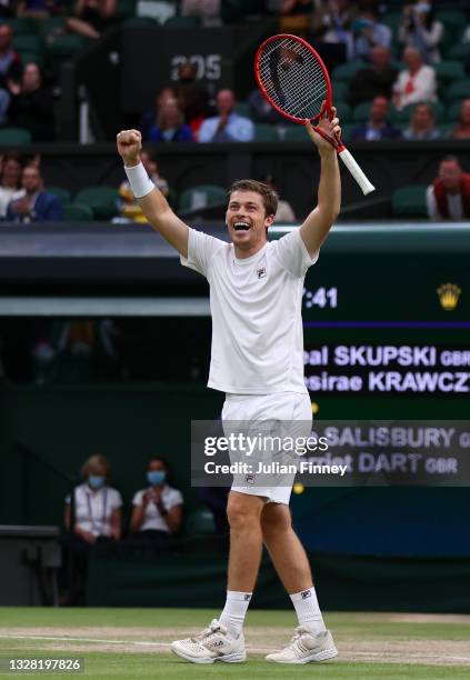 Neal Skupski of Great Britain celebrates winning their mixed doubles Final match against Joe Salisbury of Great Britain and Harriet Dart of Great...