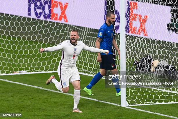 Luke Shaw of England celebrates after scoring their team's first goal during the UEFA Euro 2020 Championship Final between Italy and England at...