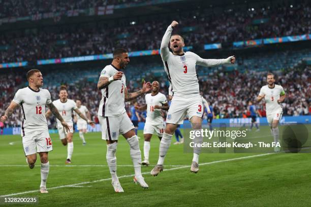 Luke Shaw of England celebrates with teammates Kieran Trippier and Kyle Walker after scoring their team's first goal during the UEFA Euro 2020...