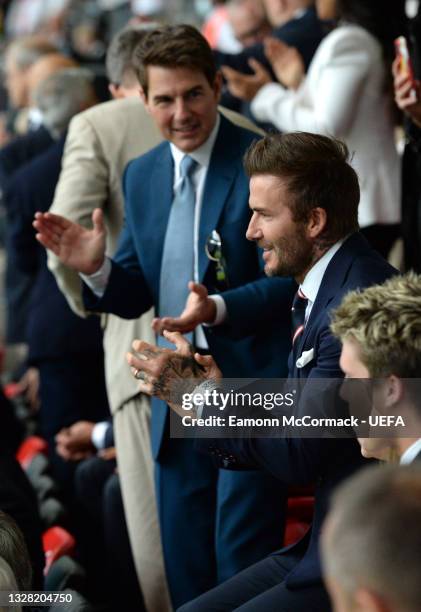 Former England international David Beckham and actor Tom Cruise applaud prior to during the UEFA Euro 2020 Championship Final between Italy and...