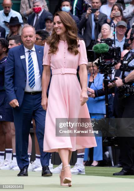 Catherine, Duchess of Cambridge attends day 13 of the Wimbledon Tennis Championships at All England Lawn Tennis and Croquet Club on July 11, 2021 in...