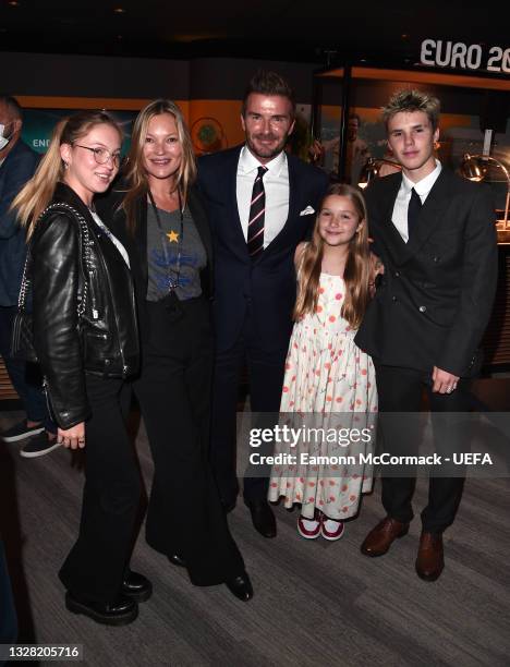 Lila Moss, Kate Moss, David Beckham, Former England International and members of his family, Harper Beckham and Cruz Beckham pose for a photograph...