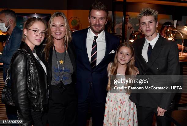 Lila Moss, Kate Moss, David Beckham, Former England International and members of his family, Harper Beckham and Cruz Beckham pose for a photograph...