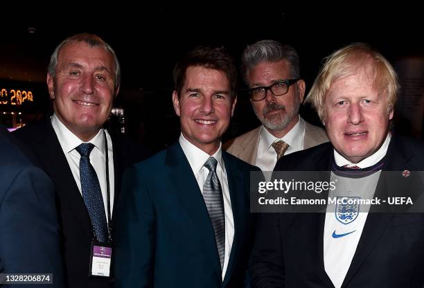 Former England international Peter Shilton, actor Tom Cruise, film director Christopher McQuarrie and Prime Minister Boris Johnson pose prior to the...