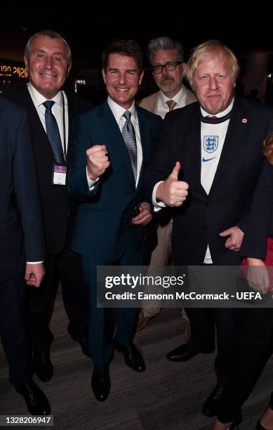 Former England international Peter Shilton, actor Tom Cruise, film director Christopher McQuarrie and Prime Minister Boris Johnson pose prior to the...