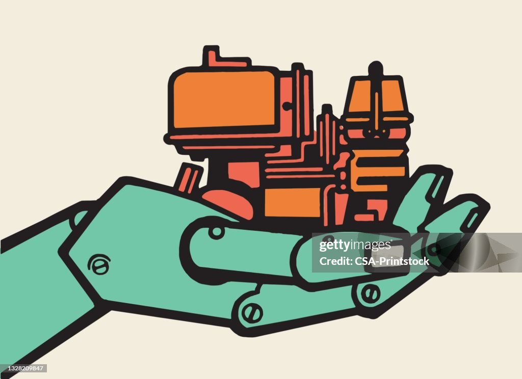 Machine With Hand Mechanical Hand Holding A Machine High-Res Vector Graphic - Getty Images