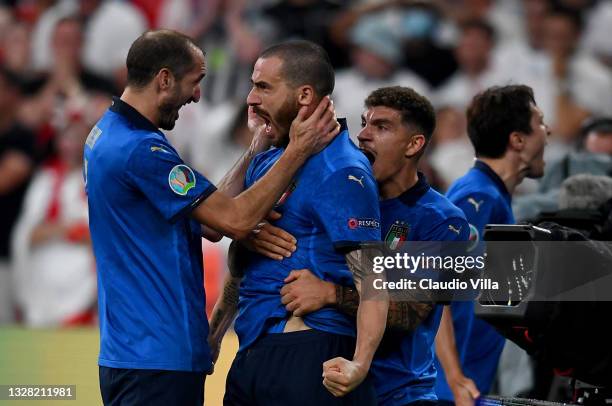 Leonardo Bonucci of Italy celebrates with Giorgio Chiellini and Giovanni Di Lorenzo after scoring their side's first goal during the UEFA Euro 2020...