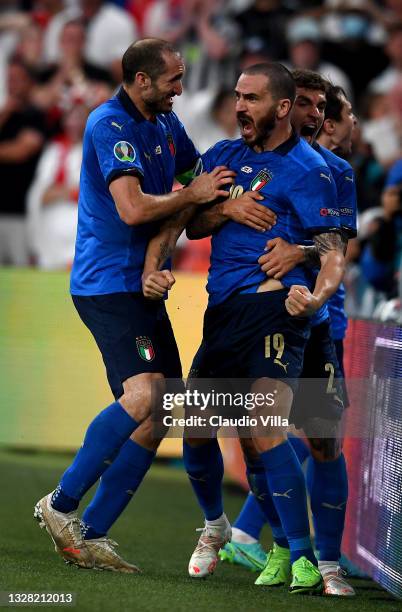 Leonardo Bonucci of Italy celebrates with Giorgio Chiellini and Giovanni Di Lorenzo after scoring their side's first goal during the UEFA Euro 2020...