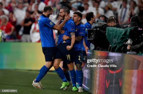 Leonardo Bonucci of Italy celebrates with Giorgio Chiellini and Giovanni Di Lorenzo after scoring their side's first goal during the UEFA Euro 2020...