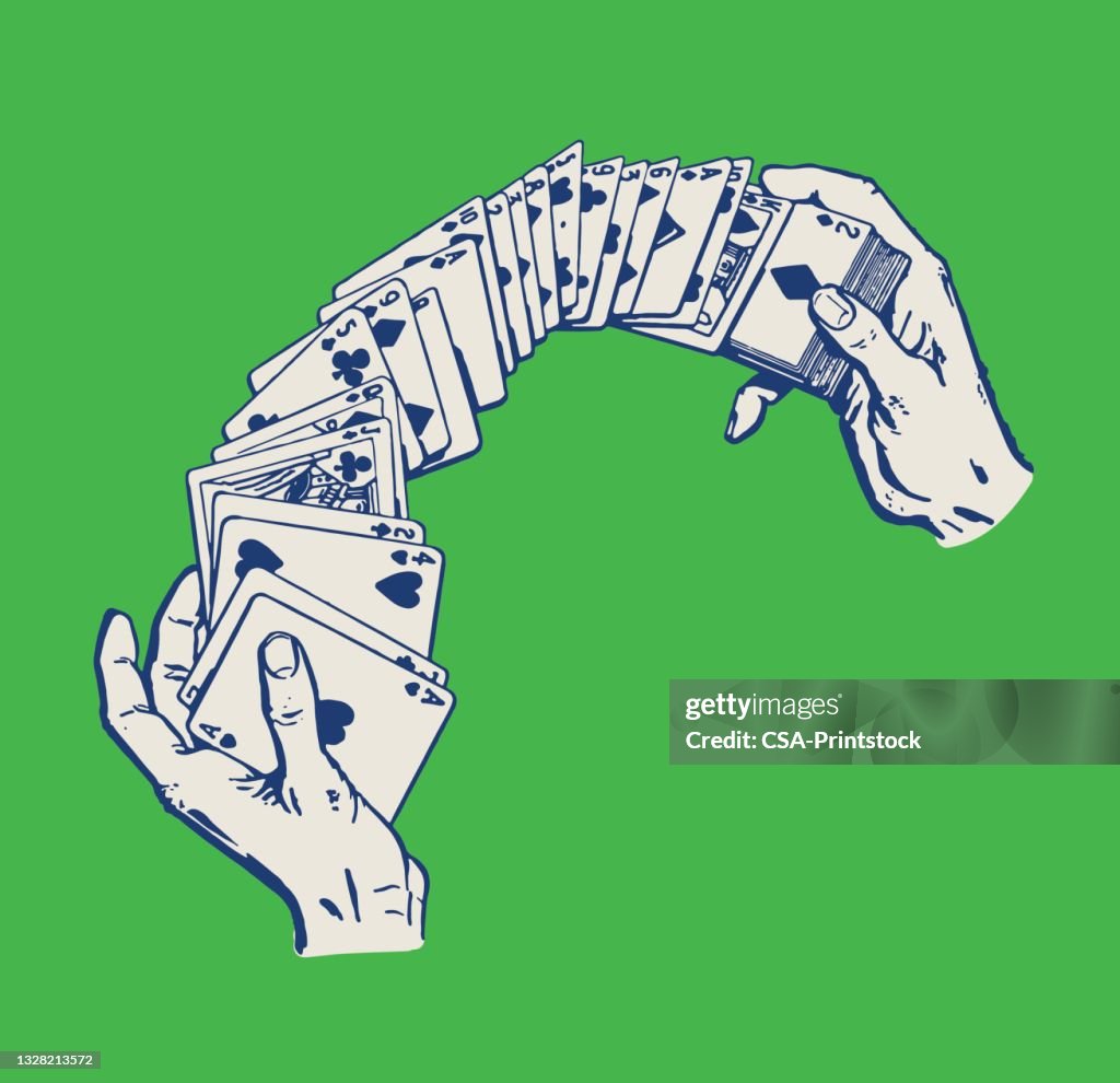 Hands Shuffling Playing Cards
