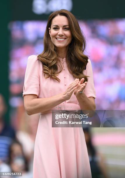 Catherine, Duchess of Cambridge attends day 13 of the Wimbledon Tennis Championships at All England Lawn Tennis and Croquet Club on July 11, 2021 in...