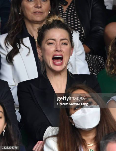 Amber Heard attends day 13 of the Wimbledon Tennis Championships at All England Lawn Tennis and Croquet Club on July 11, 2021 in London, England.