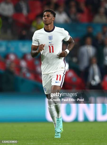 Marcus Rashford of England looks on during the UEFA Euro 2020 Championship Final between Italy and England at Wembley Stadium on July 11, 2021 in...