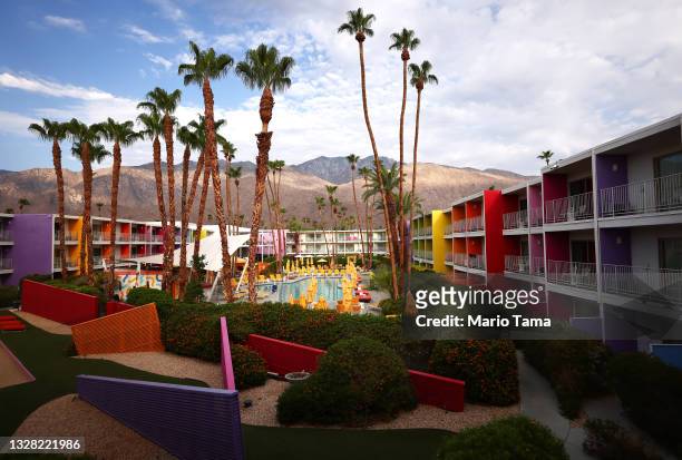 Hotel pool stands empty after sunrise before higher daytime temperatures arrive on July 11, 2021 in Palm Springs, California. "Dangerously hot...