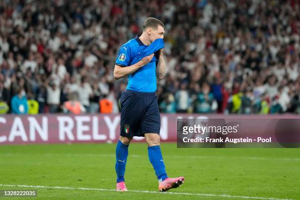 Andrea Belotti of Italy reacts after missing their side's third penalty during the UEFA Euro 2020 Championship Final between Italy and England at...