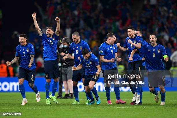 Players of Italy celebrate following their team's victory in the penalty shoot out during the UEFA Euro 2020 Championship Final between Italy and...