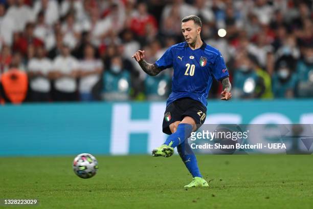 Federico Bernardeschi of Italy scores their team's fourth penalty in a penalty shoot out during the UEFA Euro 2020 Championship Final between Italy...