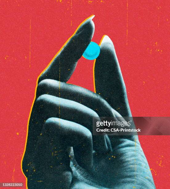 hand holding a pill - addiction stock illustrations
