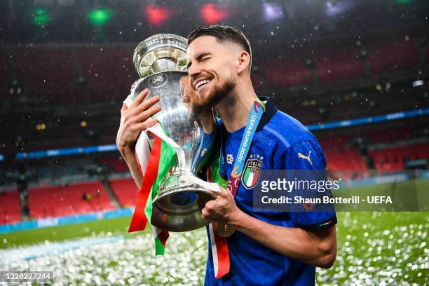 Jorginho of Italy celebrates with The Henri Delaunay Trophy following his team's victory in the UEFA Euro 2020 Championship Final between Italy and...