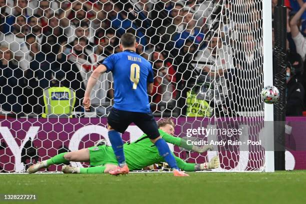 Jordan Pickford of England saves the Italy second penalty taken by Andrea Belotti of Italy in a penalty shoot out during the UEFA Euro 2020...