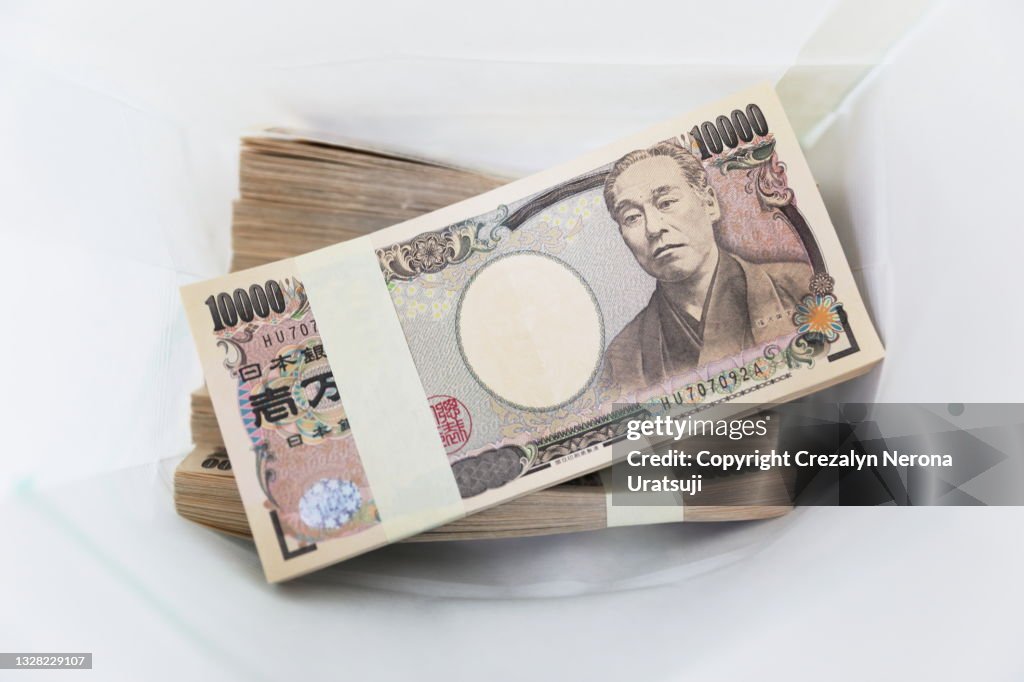 I Million Yen Japanese Money in White Paper Bag Currency of Japan
