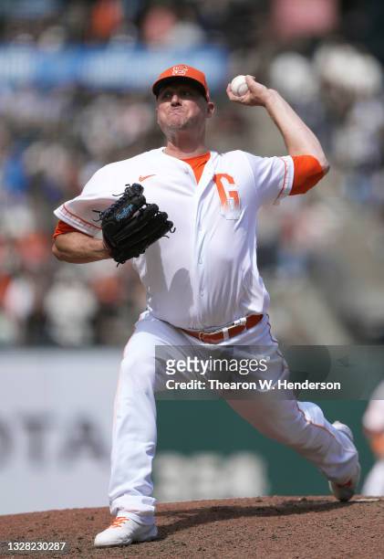 Jake McGee of the San Francisco Giants pitches against the Washington Nationals in the top of the ninth inning at Oracle Park on July 11, 2021 in San...