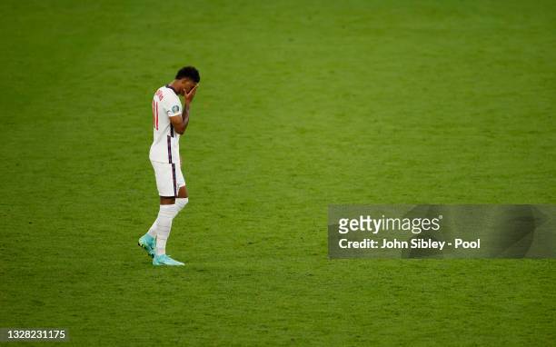 Marcus Rashford of England reacts after missing their team's third penalty in the penalty shoot out during the UEFA Euro 2020 Championship Final...