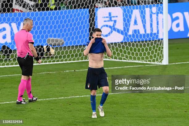 Jorginho of Italy reacts after missing their side's fifth penalty in a penalty shoot out during the UEFA Euro 2020 Championship Final between Italy...