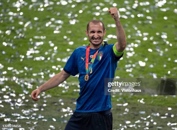 Italy captain Giorgio Chiellini celebrates after the UEFA Euro 2020 Championship Final between Italy and England at Wembley Stadium on July 11, 2021...