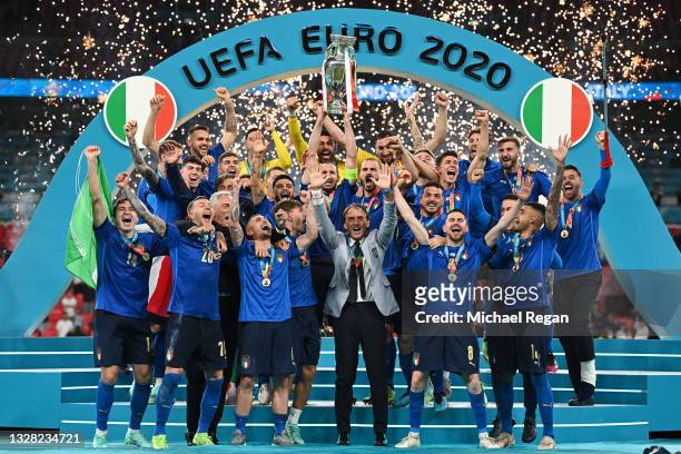 Giorgio Chiellini, Captain of Italy lifts The Henri Delaunay Trophy following his team's victory in the UEFA Euro 2020 Championship Final between...