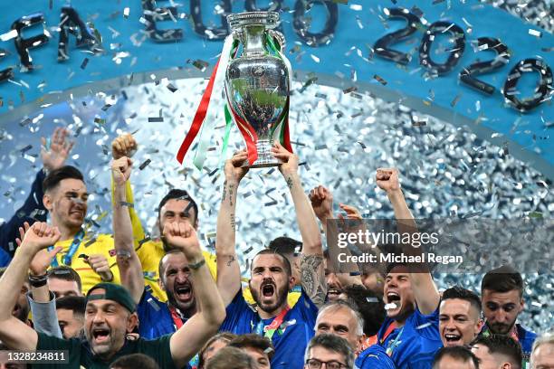 Leonardo Bonucci of Italy lifts The Henri Delaunay Trophy following his team's victory in the UEFA Euro 2020 Championship Final between Italy and...