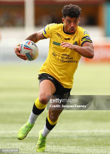 Kieran Dixon of York City Knights runs with the ball during the Betfred Championship match between London Broncos and York City Knights at...