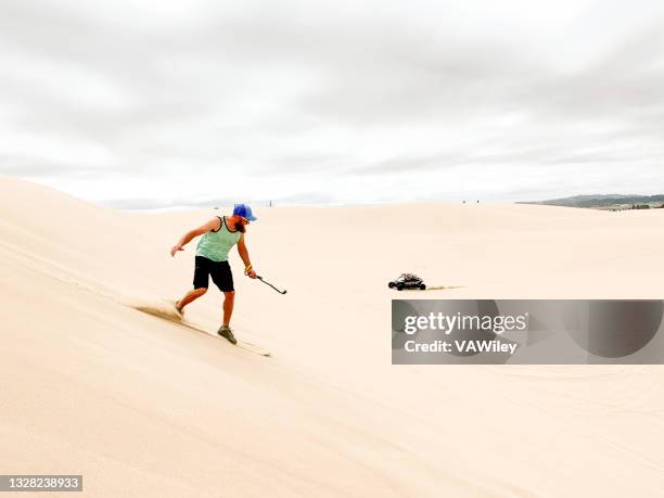 beautiful hike in sand dunes in oregon - sand boarding stock pictures, royalty-free photos & images