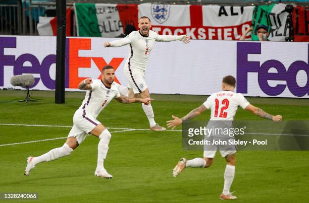 Luke Shaw of England celebrates after scoring their side's first goal during the UEFA Euro 2020 Championship Final between Italy and England at...