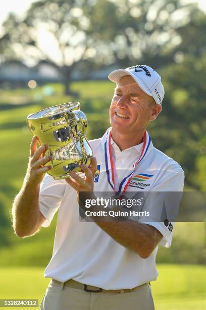 Jim Furyk of the United States poses with the trophy after winning the U.S. Senior Open Championship at the Omaha Country Club on July 11, 2021 in...