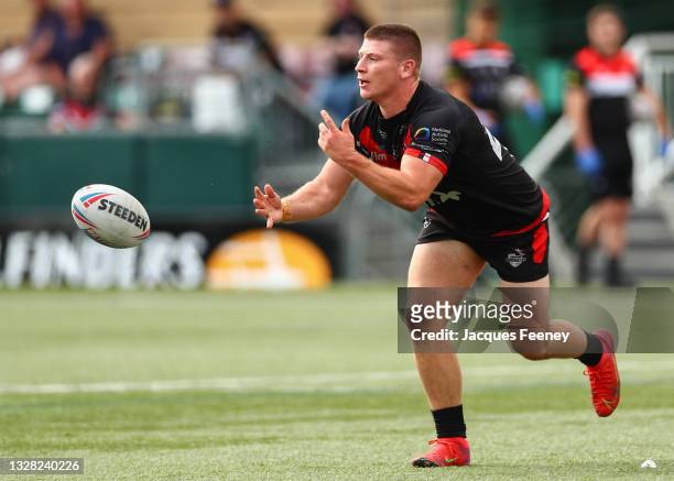 Jacob Jones of London Broncos passes the ball during the Betfred Championship match between London Broncos and York City Knights at Trailfinders...