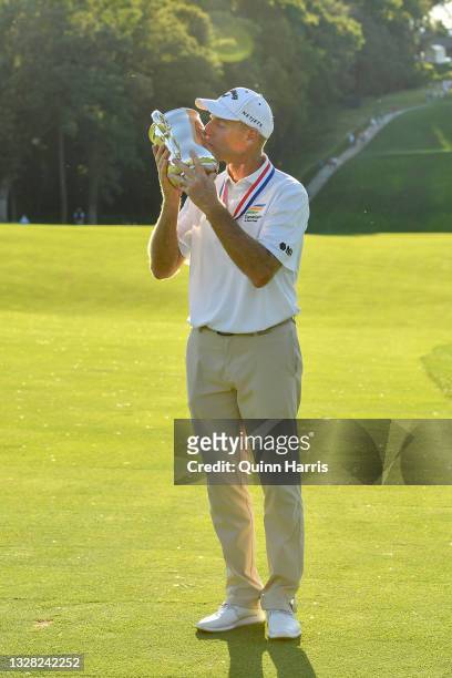 Jim Furyk of the United States poses with the trophy after winning U.S. Senior Open Championship at the Omaha Country Club on July 11, 2021 in Omaha,...