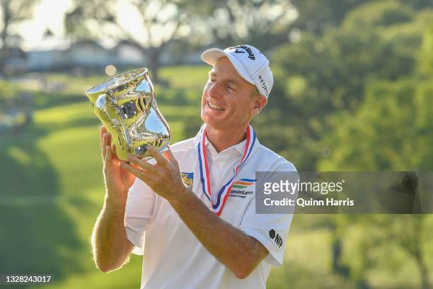 Jim Furyk of the United States poses with the trophy after winning the U.S. Senior Open Championship at the Omaha Country Club on July 11, 2021 in...