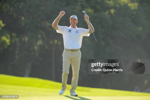 Jim Furyk of the United States reacts after his putt on the 18th hole during the final round of the U.S. Senior Open Championship at the Omaha...