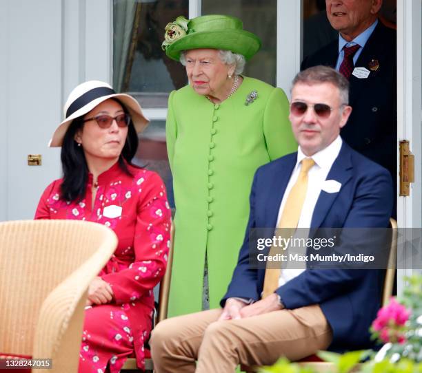 Queen Elizabeth II attends the Out-Sourcing Inc. Royal Windsor Cup polo match and a carriage driving display by the British Driving Society at Guards...