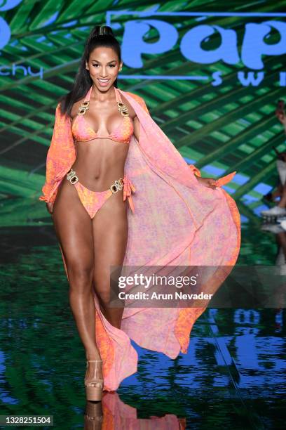 Virginia Sanhouse walks the runway at the BERRY BEACHY & PAPI SWIM Show during Miami Swim Week Powered By Art Hearts Fashion at Faena Forum on July...