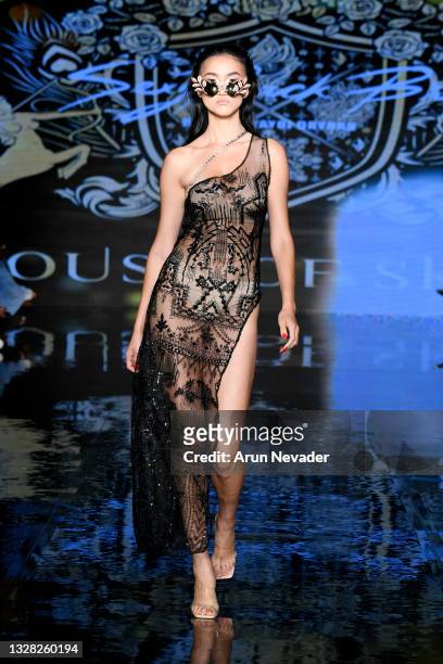 Model walks the runway at the HOUSE OF SKYE Presenting SEXYBACK BRA Show during Miami Swim Week Powered By Art Hearts Fashion at Faena Forum on July...