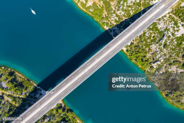 aerial view of bridge over krka river. skradin, croatia - sibenik croatia stock pictures, royalty-free photos & images