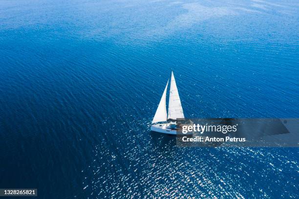 yacht with white sails at sea. luxury vacation at sea, yachting in croatia. - navegación en yate fotografías e imágenes de stock